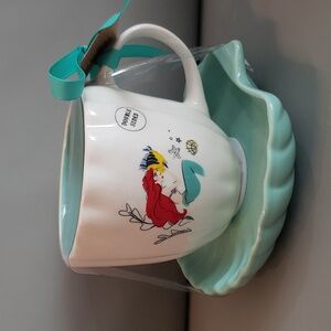Rae Dunn “Little Mermaid" Mug with a bluish green shell shaped saucer NWT